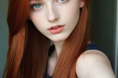 AI girl with red hair wallpaper