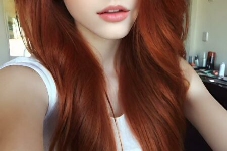 AI girl with red hair wallpaper