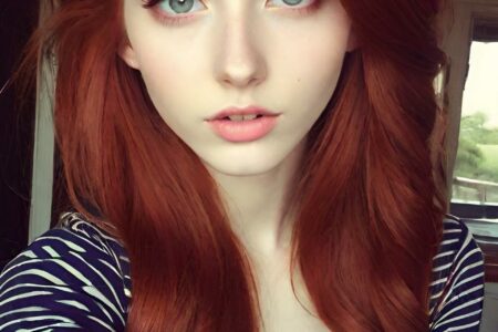 AI girl with red hair wallpaper