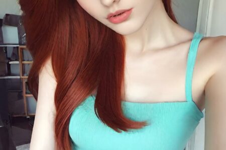 AI girl with red hair wallpaper