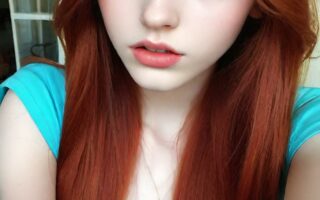 AI girl with red hair wallpaper