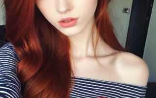 AI girl with red hair wallpaper