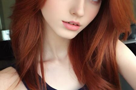AI girl with red hair wallpaper