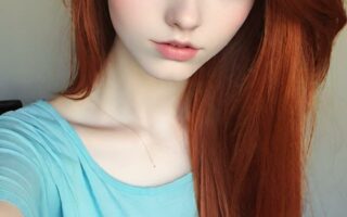 AI girl with red hair wallpaper