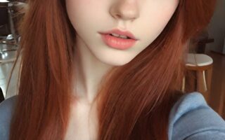 AI girl with red hair wallpaper