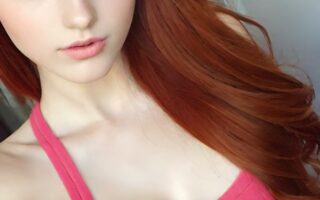 AI girl with red hair wallpaper