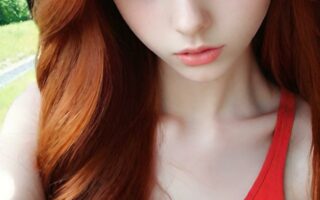AI girl with red hair wallpaper