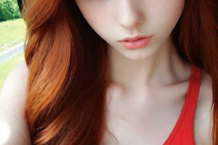 AI girl with red hair wallpaper