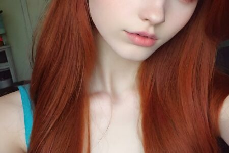 AI girl with red hair wallpaper