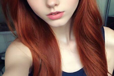 AI girl with red hair wallpaper