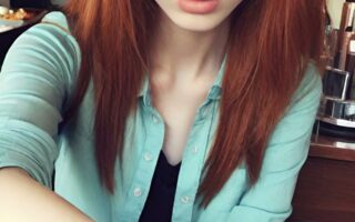 AI girl with red hair wallpaper