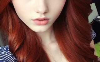 AI girl with red hair wallpaper