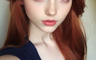 AI girl with red hair wallpaper