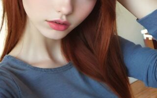 AI girl with red hair wallpaper