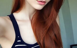 AI girl with red hair wallpaper