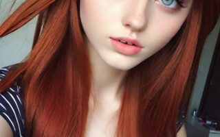 AI girl with red hair wallpaper