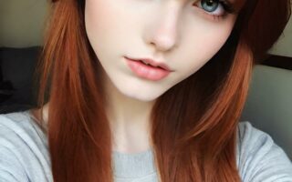 AI girl with red hair wallpaper