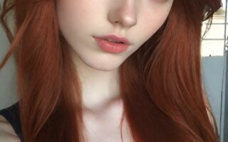 AI girl with red hair wallpaper