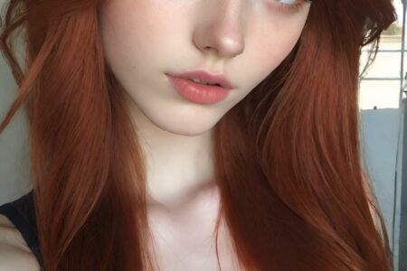 AI girl with red hair wallpaper