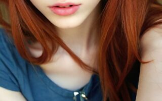 AI girl with red hair wallpaper