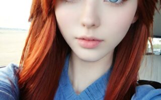 AI girl with red hair wallpaper