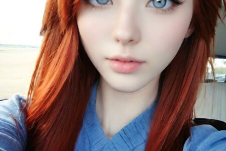 AI girl with red hair wallpaper