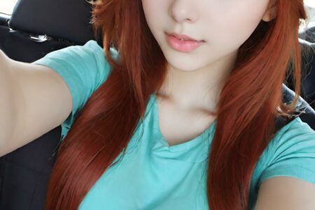 AI girl with red hair wallpaper