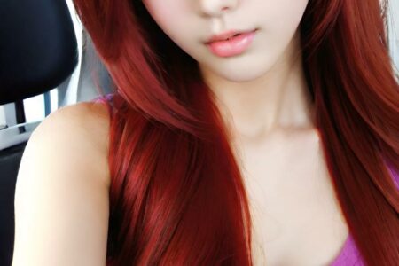 AI girl with red hair wallpaper