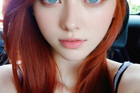 AI girl with red hair wallpaper