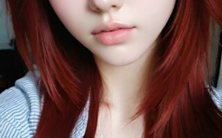 AI girl with red hair wallpaper