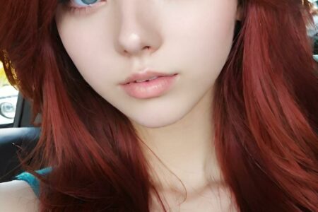 AI girl with red hair wallpaper