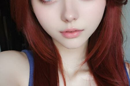 AI girl with red hair wallpaper